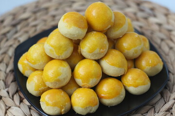 nastar cookies, pineapple tarts or nanas tart are small, bite-size pastries