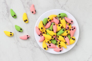 caterpillar cake with various colors.