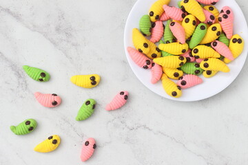 caterpillar cake with various colors.