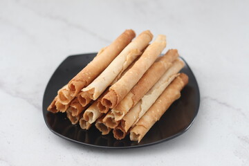 egg roll or Semprong is snacks that normally serve on Hari Raya or Eid Al Fitr