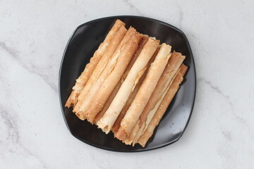 egg roll or Semprong is snacks that normally serve on Hari Raya or Eid Al Fitr