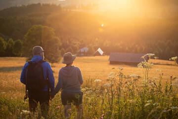 Fototapeta premium Joyful couple relaxing in nature