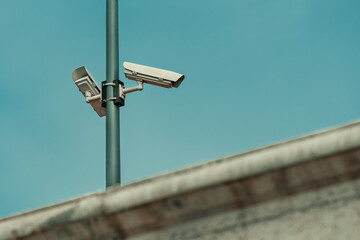 Security cameras for video surveillance behind the concrete wall