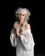 Close up portrait of beautiful women with long blonde hair, wearing white fantasy princess ball...
