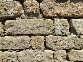 Close up of the stone rock wall.