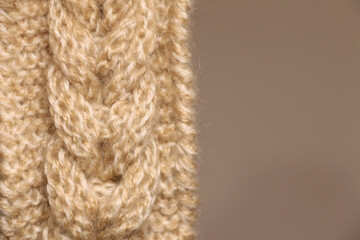 Knitted pattern pigtail. Place for text