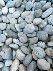 Fototapeta na wymiar Close up of a pile of cobblestones.