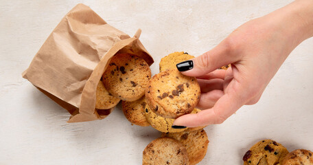 National Cookie Day with yummy freshly chocolate chip cookies on a white background. Top view.