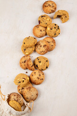 National Cookie Day with yummy freshly chocolate chip cookies on a white background. Top view.
