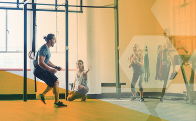 Fototapeta premium Overlay, fitness and man with group for training, gym workout and sports motivation. Happy, exercise and male coach excited with people at a club for sport, cardio and lifestyle class together