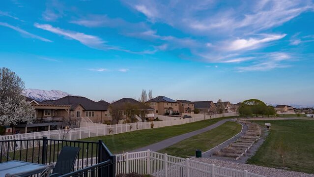 Panoramic time lapse from the backyard deck of a suburban home - day to night