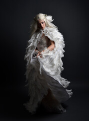 fantasy portrait of beautiful female model with long blond hair wearing otherworldly  white...