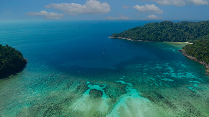 Fototapeta na wymiar The tropical seashore island in a coral reef ,blue and turquoise sea Amazing nature landscape