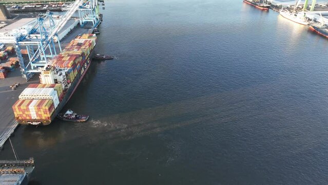 Aerial Time Lapse of a Cargo Ship Being Turned Around on the Delaware River in Philadelphia PA