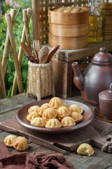 Kueh Bolu or Kuih Bahulu is a sponge cake. Asian traditional food is popular in Malaysia and Indonesia.