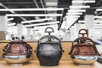 Traditional Afghan kazan or cauldron with lid with valves for central asian pressure cooking on a...