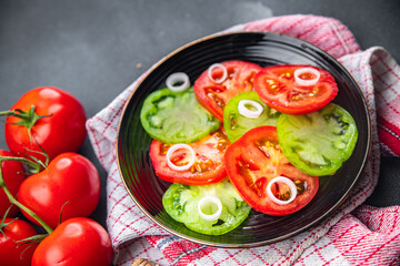 fresh vegetables salad red tomato and green tomato dish healthy meal food snack on the table copy space food background rustic top view keto or paleo diet veggie vegan or vegetarian food