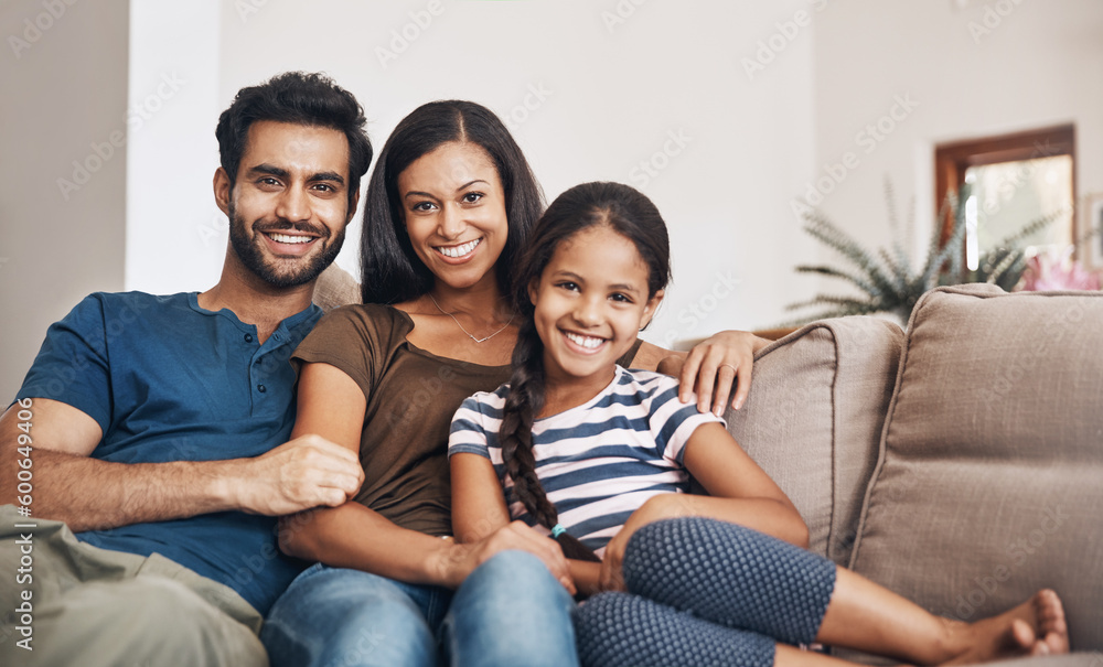 Sticker Happy family, smile and portrait on the sofa to relax, bond and sitting comfortable. Content, quality time and a mother, father and girl child on the living room couch for happiness, love and care