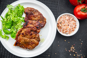 pork fried meat healthy meal food snack on the table copy space food background rustic top view keto or paleo diet