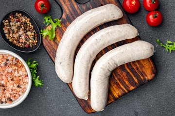 Raw white sausage weisswurst veal, pork, lard, spices natural meal food snack on the table copy...