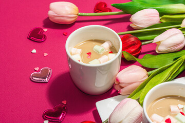 Valentine's Day romantic concept. Coffee with marshmallows, tulips flowers, traditional design