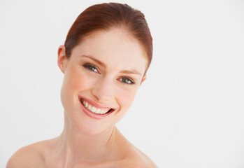 Obraz premium Skincare, beauty and portrait of woman in studio for cosmetics, wellness and facial on white background. Dermatology, spa and happy face of female person with natural makeup, smooth and health skin
