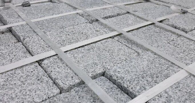 Packing of aerated concrete blocks for partitions. Block lies on pallet and is tightened with packing tape