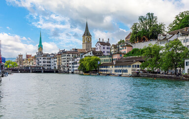 Scenic view of historic Zurich city center with famous Fraumunster and river Limmat at Lake Zurich,Switzerland
