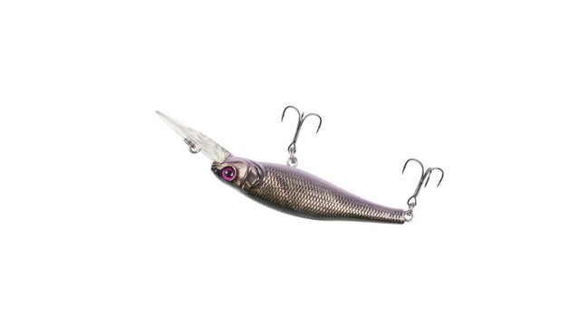 Metal fishing lure isolated on white background. Spinner lure wobbler rotates 