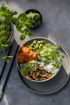 Vegetarian bowl with Bean, avocado, rice, mushroom and vegetable.