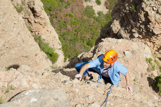 Climbing in the Mallos de Riglos, the peak known as Aguja Roja.