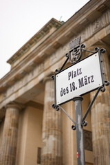 Sign: "Platz des 18. MÄRZ" at the Brandenburg Gate, Berlin