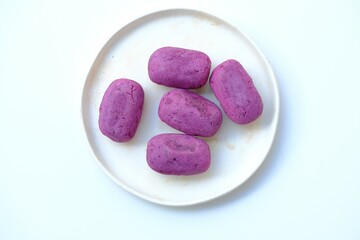 Timus on plate with white background. Traditional snack from Indonesia. Made from sweet potato