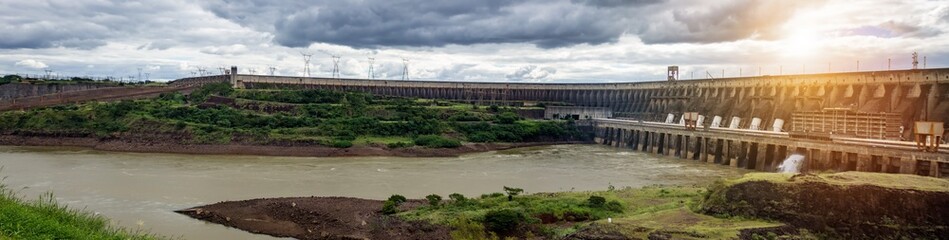 Panoramic view of modern giant dam on Parana river, South America. Itaipu Binacional hydroelectric...