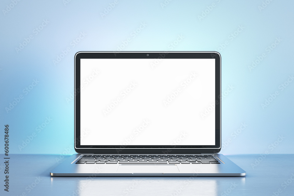 Poster creative blue designer workplace with empty white mock up laptop monitor. 3d rendering.