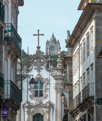 Fototapeta na wymiar Sanctuary of the Sacred Heart of Jesus located on top of the mountain of Santa Luzia with the Malheiras Chapel in the foreground in the Portuguese city of Viana do Castelo.