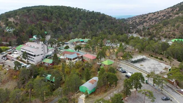 Typical Cyprus village in the Troodos Mountains. Panoramic view near of Troodos, village in the Troodos Mountains. Limassol district, Cyprus, Mediterranean Sea. Mountain landscape and sunny day.