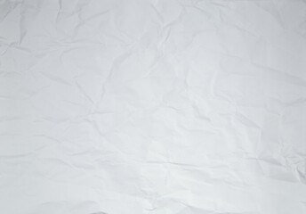 Fototapeta na wymiar Wrinkled and Crumpled Paper Textured Background