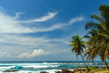 Blue sky with beautiful clouds on the shore of a tropical island