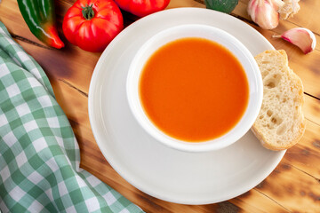 gazpacho, typical food from the South of Spain, would be a kind of tomato soup made with bread, tomato, garlic, extra virgin olive oil, salt, green bell pepper and and cucumber. Concept gastronomy