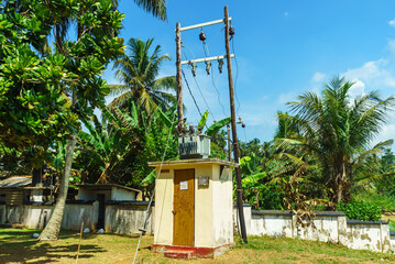 Electrical substation with high voltage wires in the tropics