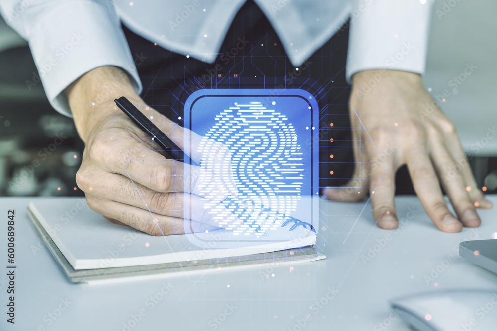 Aufkleber abstract creative fingerprint concept with hand writing in notebook on background with laptop. multi