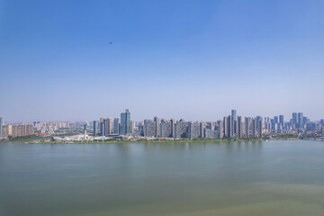 Fototapeta premium Skyline of buildings on the east bank of Xiangjiang River in Changsha, China