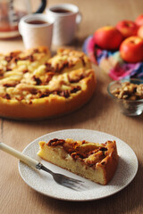 Apple pie with walnuts - typical autumn dish