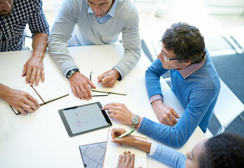Hands, group and tablet in top view for teamwork, business people or plan strategy together in...