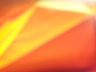 Blurred background, gradient, gold and orange with light.