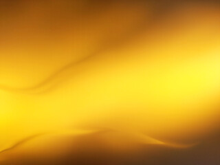 blurred background gradient gold color with abstract light