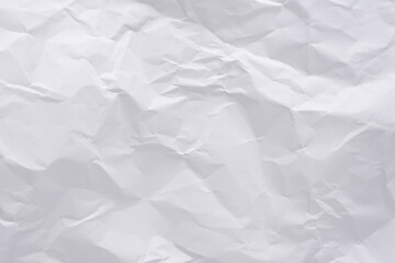White crumpled paper texture background, clean white wrinkled paper, top view.