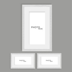 Three wooden photos frame on isolated dark background