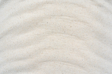 Fototapeta na wymiar White sand background, macro close up of white sand or abstract white sand wave texture.
